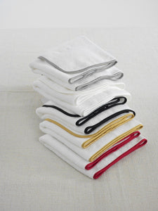 Satin Luxe white with red binding towel